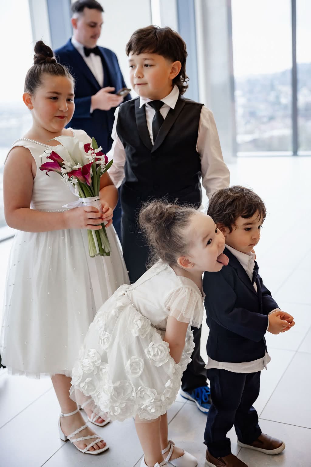 Flower girls and ring bearers waiting before the ceremony